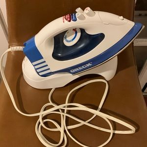 Oreck steam iron with stand. Rarely used